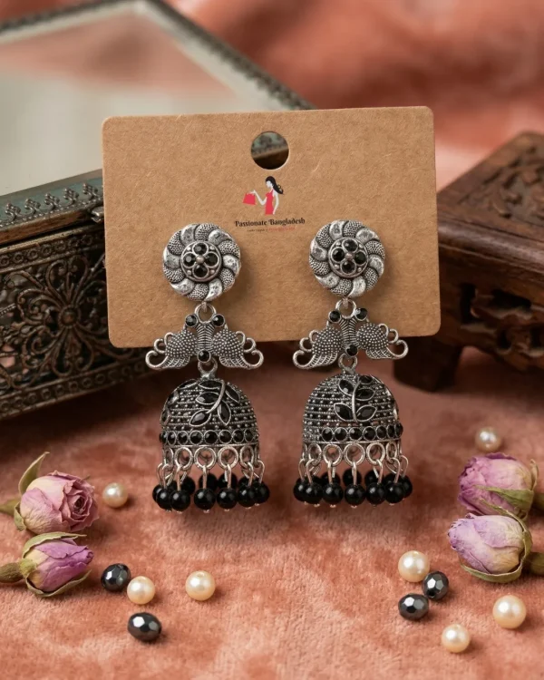 Traditional oxidized-style jhumka earrings with red, yellow and blue stones, perfect for saree, salwar and festive party looks from Passionate Bangladesh. Shop now at www.passionatebangladesh.com