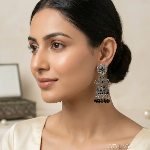 Traditional oxidized-style jhumka earrings with red, yellow and blue stones, perfect for saree, salwar and festive party looks from Passionate Bangladesh. Shop now at www.passionatebangladesh.com