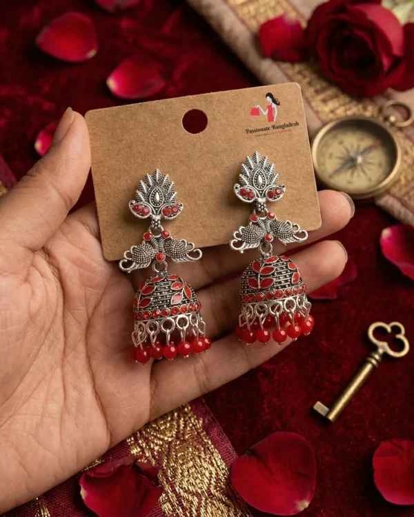 Traditional oxidized-style jhumka earrings with red, yellow and blue stones, perfect for saree, salwar and festive party looks from Passionate Bangladesh. Shop now at www.passionatebangladesh.com
