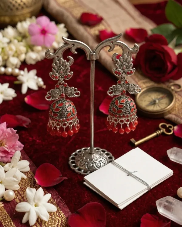 Traditional oxidized-style jhumka earrings with red, yellow and blue stones, perfect for saree, salwar and festive party looks from Passionate Bangladesh. Shop now at www.passionatebangladesh.com