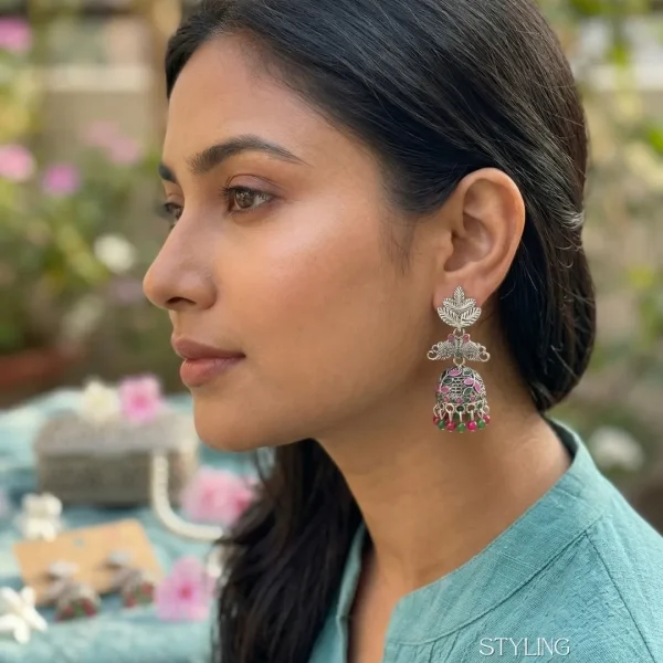 Traditional oxidized-style jhumka earrings with red, yellow and blue stones, perfect for saree, salwar and festive party looks from Passionate Bangladesh. Shop now at www.passionatebangladesh.com