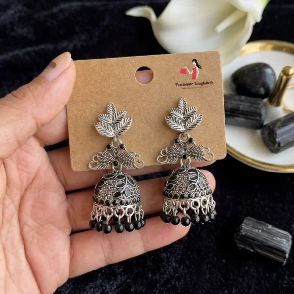 Traditional oxidized-style jhumka earrings with red, yellow and blue stones, perfect for saree, salwar and festive party looks from Passionate Bangladesh. Shop now at www.passionatebangladesh.com