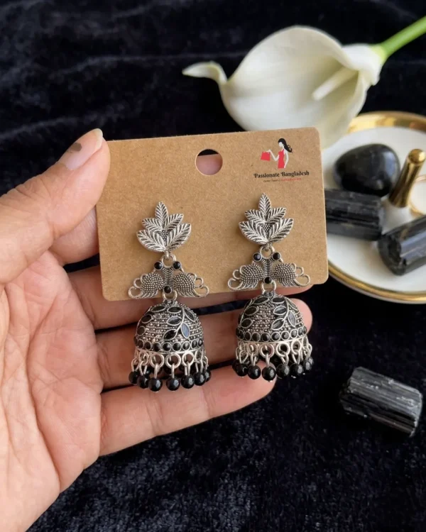 Traditional oxidized-style jhumka earrings with red, yellow and blue stones, perfect for saree, salwar and festive party looks from Passionate Bangladesh. Shop now at www.passionatebangladesh.com