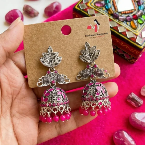 Traditional oxidized-style jhumka earrings with red, yellow and blue stones, perfect for saree, salwar and festive party looks from Passionate Bangladesh. Shop now at www.passionatebangladesh.com