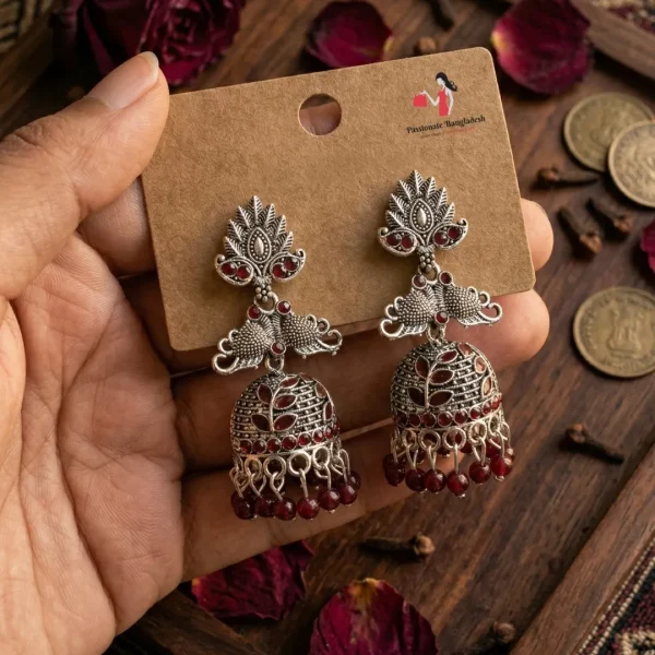 Traditional oxidized-style jhumka earrings with red, yellow and blue stones, perfect for saree, salwar and festive party looks from Passionate Bangladesh. Shop now at www.passionatebangladesh.com