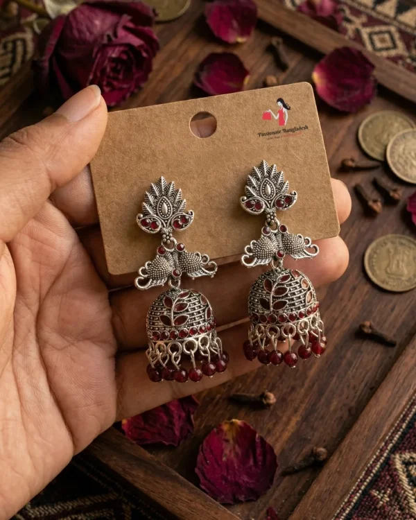 Traditional oxidized-style jhumka earrings with red, yellow and blue stones, perfect for saree, salwar and festive party looks from Passionate Bangladesh. Shop now at www.passionatebangladesh.com