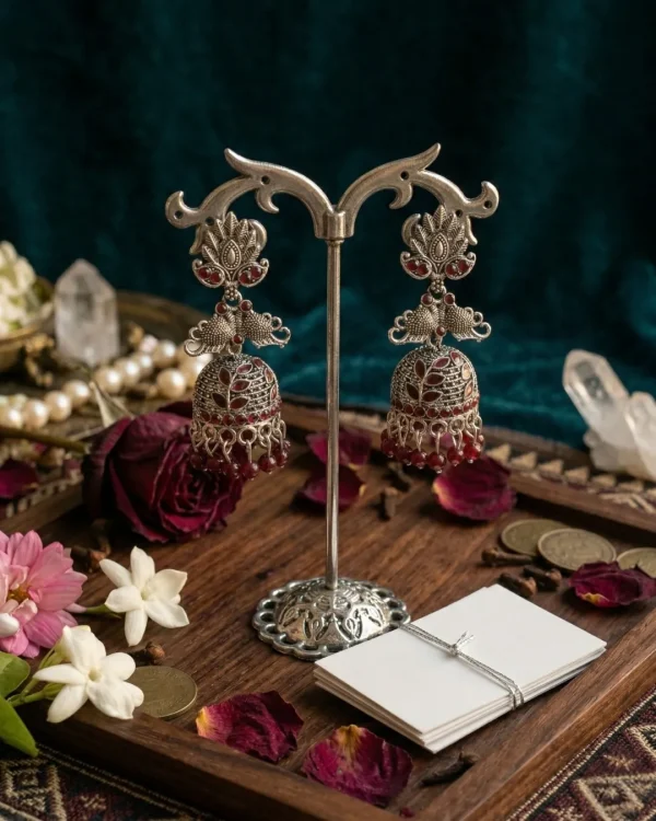 Traditional oxidized-style jhumka earrings with red, yellow and blue stones, perfect for saree, salwar and festive party looks from Passionate Bangladesh. Shop now at www.passionatebangladesh.com