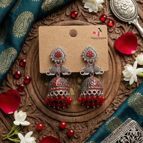 Traditional oxidized-style jhumka earrings with red, yellow and blue stones, perfect for saree, salwar and festive party looks from Passionate Bangladesh. Shop now at www.passionatebangladesh.com
