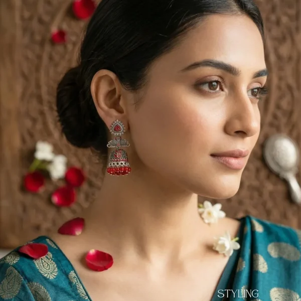 Traditional oxidized-style jhumka earrings with red, yellow and blue stones, perfect for saree, salwar and festive party looks from Passionate Bangladesh. Shop now at www.passionatebangladesh.com