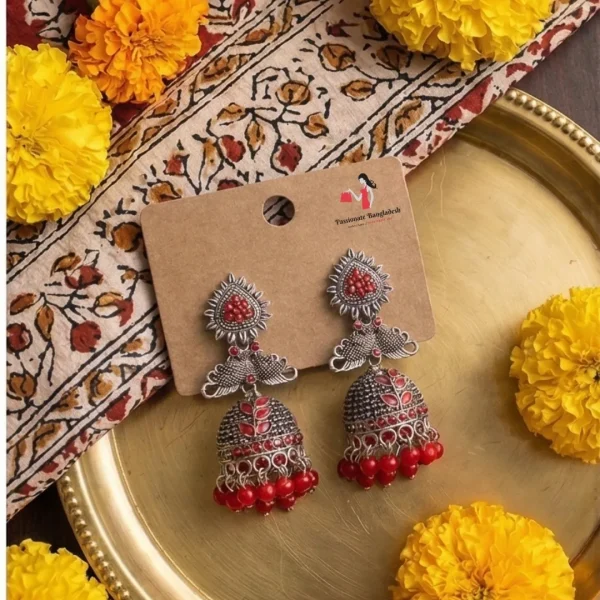 Traditional oxidized-style jhumka earrings with red, yellow and blue stones, perfect for saree, salwar and festive party looks from Passionate Bangladesh. Shop now at www.passionatebangladesh.com