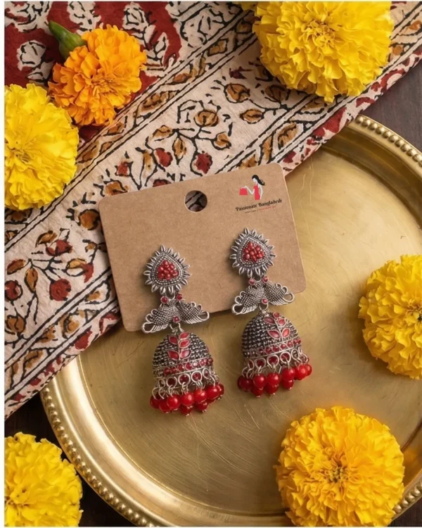 Traditional oxidized-style jhumka earrings with red, yellow and blue stones, perfect for saree, salwar and festive party looks from Passionate Bangladesh. Shop now at www.passionatebangladesh.com