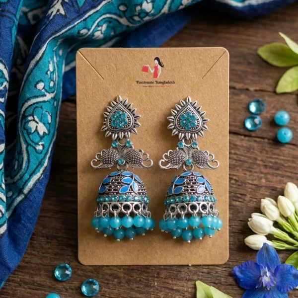 Traditional oxidized-style jhumka earrings with red, yellow and blue stones, perfect for saree, salwar and festive party looks from Passionate Bangladesh. Shop now at www.passionatebangladesh.com