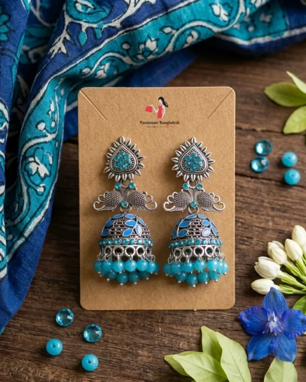 Traditional oxidized-style jhumka earrings with red, yellow and blue stones, perfect for saree, salwar and festive party looks from Passionate Bangladesh. Shop now at www.passionatebangladesh.com