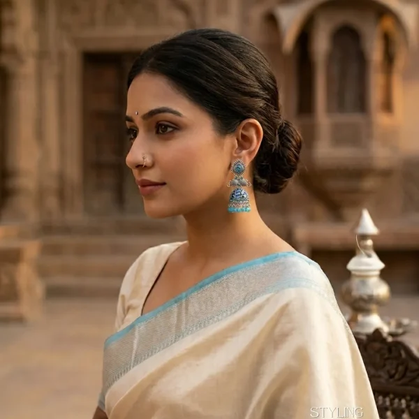 Traditional oxidized-style jhumka earrings with red, yellow and blue stones, perfect for saree, salwar and festive party looks from Passionate Bangladesh. Shop now at www.passionatebangladesh.com