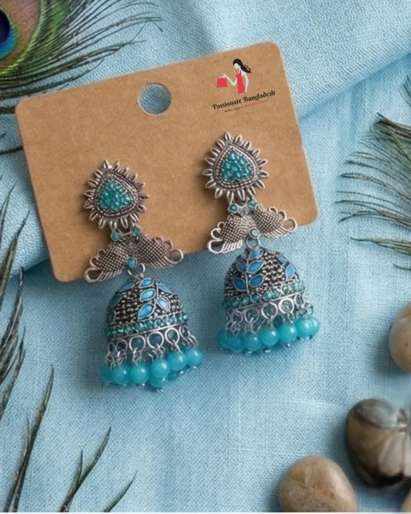 Traditional oxidized-style jhumka earrings with red, yellow and blue stones, perfect for saree, salwar and festive party looks from Passionate Bangladesh. Shop now at www.passionatebangladesh.com
