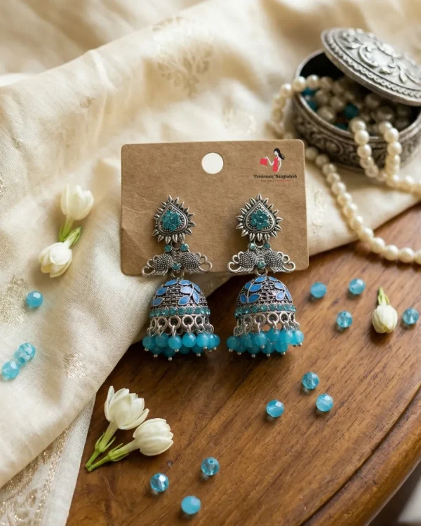 Traditional oxidized-style jhumka earrings with red, yellow and blue stones, perfect for saree, salwar and festive party looks from Passionate Bangladesh. Shop now at www.passionatebangladesh.com