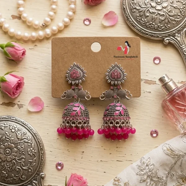 Traditional oxidized-style jhumka earrings with red, yellow and blue stones, perfect for saree, salwar and festive party looks from Passionate Bangladesh. Shop now at www.passionatebangladesh.com