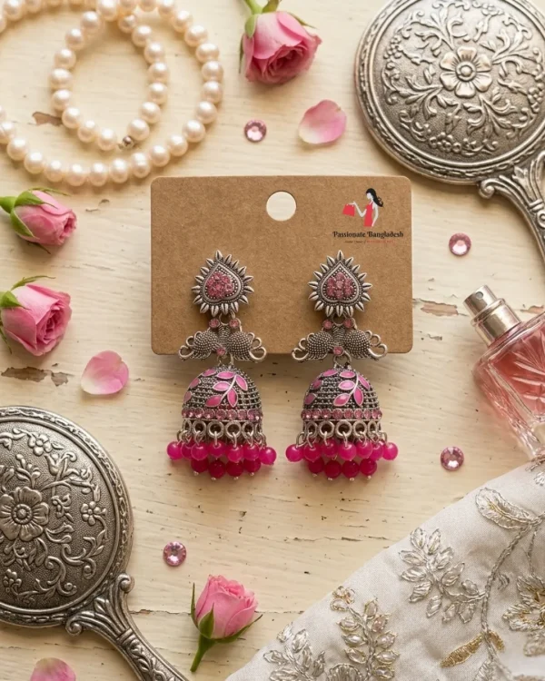 Traditional oxidized-style jhumka earrings with red, yellow and blue stones, perfect for saree, salwar and festive party looks from Passionate Bangladesh. Shop now at www.passionatebangladesh.com