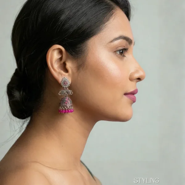 Traditional oxidized-style jhumka earrings with red, yellow and blue stones, perfect for saree, salwar and festive party looks from Passionate Bangladesh. Shop now at www.passionatebangladesh.com