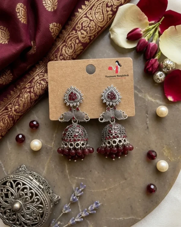 Traditional oxidized-style jhumka earrings with red, yellow and blue stones, perfect for saree, salwar and festive party looks from Passionate Bangladesh. Shop now at www.passionatebangladesh.com