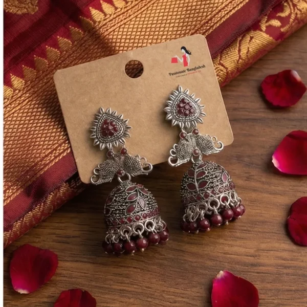 Traditional oxidized-style jhumka earrings with red, yellow and blue stones, perfect for saree, salwar and festive party looks from Passionate Bangladesh. Shop now at www.passionatebangladesh.com