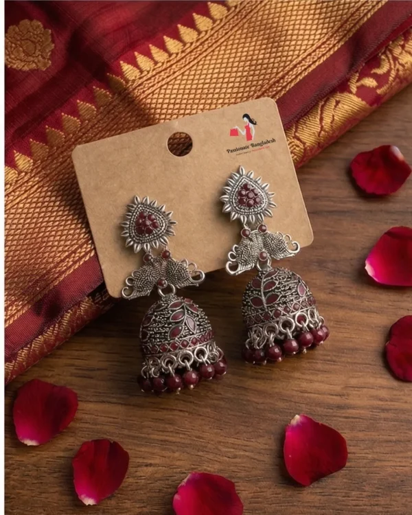 Traditional oxidized-style jhumka earrings with red, yellow and blue stones, perfect for saree, salwar and festive party looks from Passionate Bangladesh. Shop now at www.passionatebangladesh.com