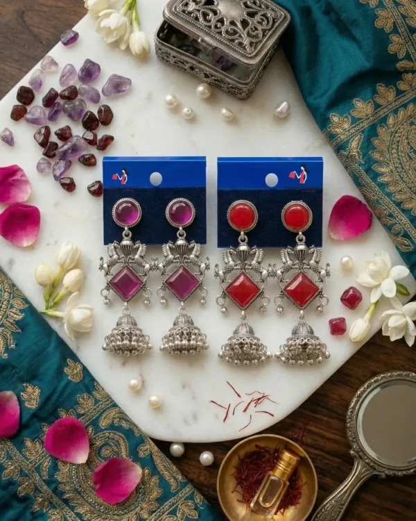 Traditional oxidized-style jhumka earrings with red, yellow and blue stones, perfect for saree, salwar and festive party looks from Passionate Bangladesh. Shop now at www.passionatebangladesh.com