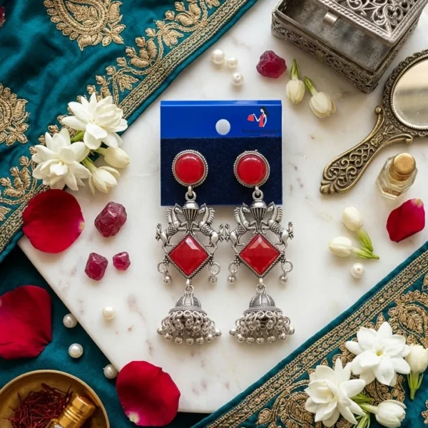 Traditional oxidized-style jhumka earrings with red, yellow and blue stones, perfect for saree, salwar and festive party looks from Passionate Bangladesh. Shop now at www.passionatebangladesh.com