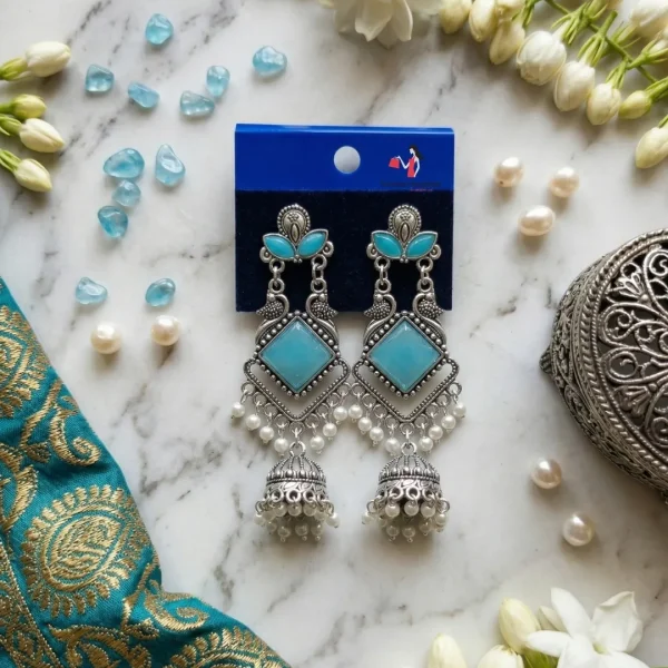 Traditional oxidized-style jhumka earrings with red, yellow and blue stones, perfect for saree, salwar and festive party looks from Passionate Bangladesh. Shop now at www.passionatebangladesh.com
