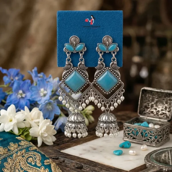 Traditional oxidized-style jhumka earrings with red, yellow and blue stones, perfect for saree, salwar and festive party looks from Passionate Bangladesh. Shop now at www.passionatebangladesh.com