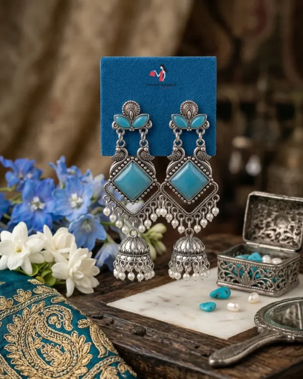Traditional oxidized-style jhumka earrings with red, yellow and blue stones, perfect for saree, salwar and festive party looks from Passionate Bangladesh. Shop now at www.passionatebangladesh.com