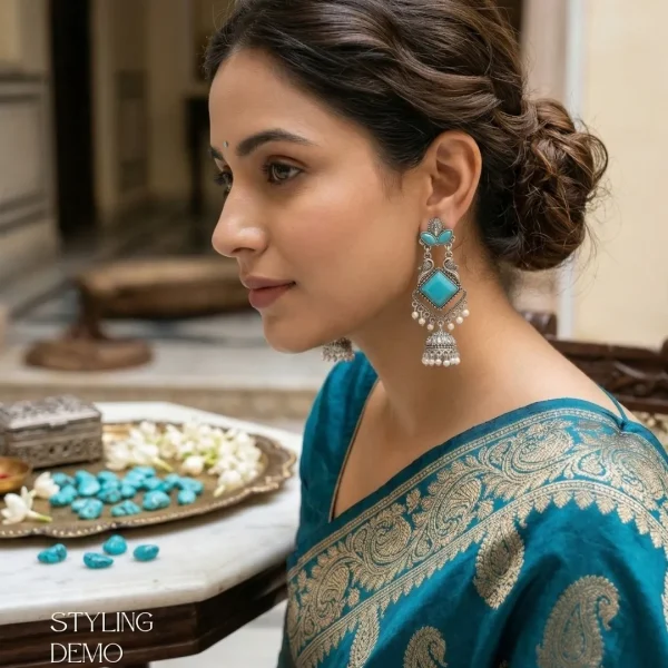Traditional oxidized-style jhumka earrings with red, yellow and blue stones, perfect for saree, salwar and festive party looks from Passionate Bangladesh. Shop now at www.passionatebangladesh.com