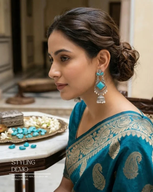 Traditional oxidized-style jhumka earrings with red, yellow and blue stones, perfect for saree, salwar and festive party looks from Passionate Bangladesh. Shop now at www.passionatebangladesh.com
