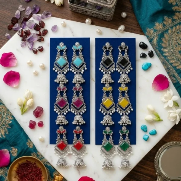 Traditional oxidized-style jhumka earrings with red, yellow and blue stones, perfect for saree, salwar and festive party looks from Passionate Bangladesh. Shop now at www.passionatebangladesh.com