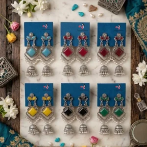Traditional oxidized-style jhumka earrings with red, yellow and blue stones, perfect for saree, salwar and festive party looks from Passionate Bangladesh. Shop now at www.passionatebangladesh.com