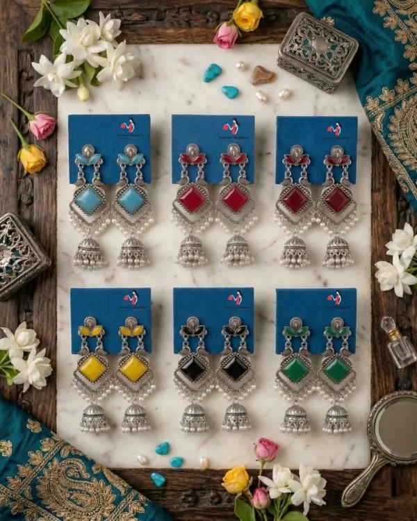 Traditional oxidized-style jhumka earrings with red, yellow and blue stones, perfect for saree, salwar and festive party looks from Passionate Bangladesh. Shop now at www.passionatebangladesh.com