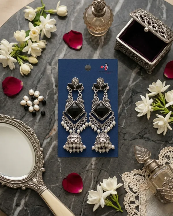 Traditional oxidized-style jhumka earrings with red, yellow and blue stones, perfect for saree, salwar and festive party looks from Passionate Bangladesh. Shop now at www.passionatebangladesh.com