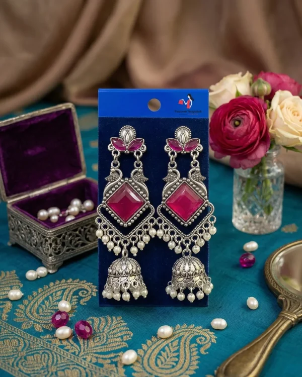 Traditional oxidized-style jhumka earrings with red, yellow and blue stones, perfect for saree, salwar and festive party looks from Passionate Bangladesh. Shop now at www.passionatebangladesh.com