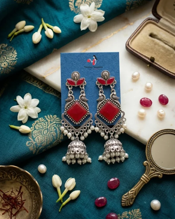 Traditional oxidized-style jhumka earrings with red, yellow and blue stones, perfect for saree, salwar and festive party looks from Passionate Bangladesh. Shop now at www.passionatebangladesh.com