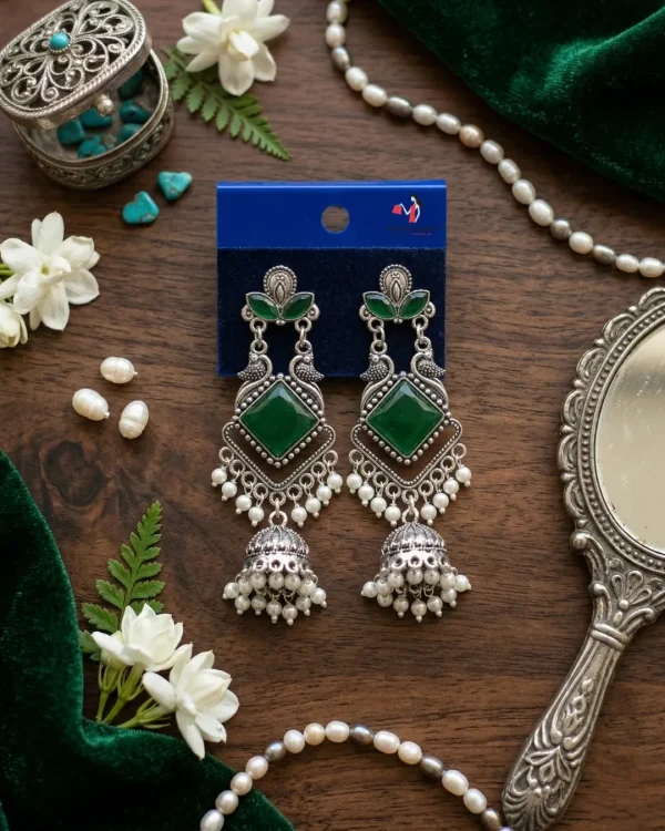 Traditional oxidized-style jhumka earrings with red, yellow and blue stones, perfect for saree, salwar and festive party looks from Passionate Bangladesh. Shop now at www.passionatebangladesh.com
