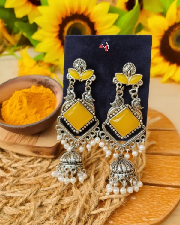 Traditional oxidized-style jhumka earrings with red, yellow and blue stones, perfect for saree, salwar and festive party looks from Passionate Bangladesh. Shop now at www.passionatebangladesh.com