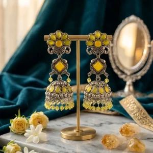 Traditional oxidized-style jhumka earrings with red, yellow and blue stones, perfect for saree, salwar and festive party looks from Passionate Bangladesh. Shop now at www.passionatebangladesh.com
