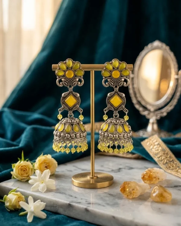 Traditional oxidized-style jhumka earrings with red, yellow and blue stones, perfect for saree, salwar and festive party looks from Passionate Bangladesh. Shop now at www.passionatebangladesh.com