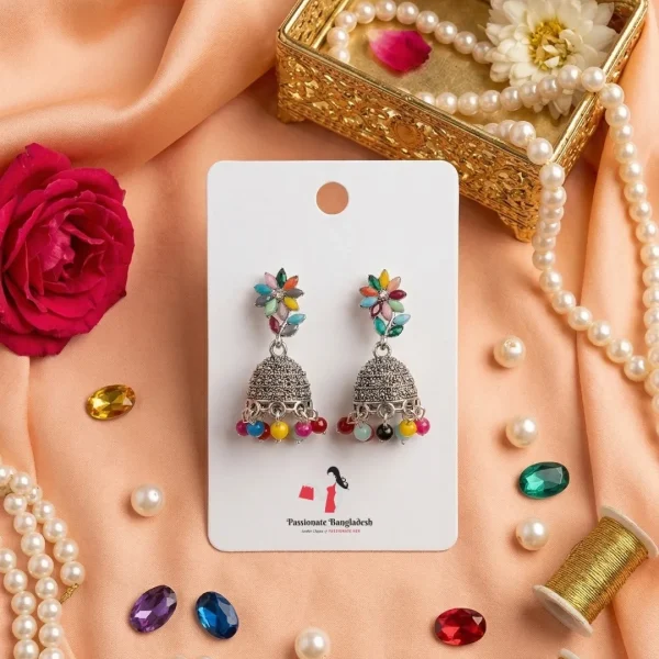 Traditional oxidized-style jhumka earrings with red, yellow and blue stones, perfect for saree, salwar and festive party looks from Passionate Bangladesh. Shop now at www.passionatebangladesh.com