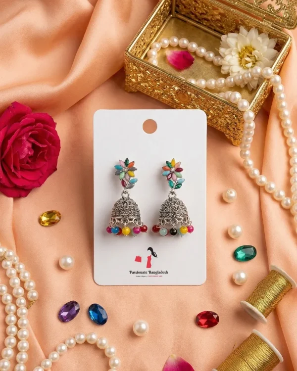 Traditional oxidized-style jhumka earrings with red, yellow and blue stones, perfect for saree, salwar and festive party looks from Passionate Bangladesh. Shop now at www.passionatebangladesh.com