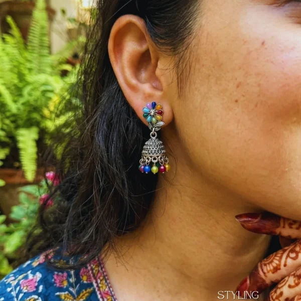 Traditional oxidized-style jhumka earrings with red, yellow and blue stones, perfect for saree, salwar and festive party looks from Passionate Bangladesh. Shop now at www.passionatebangladesh.com