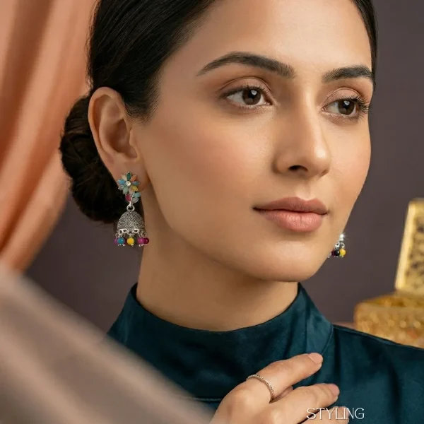 Traditional oxidized-style jhumka earrings with red, yellow and blue stones, perfect for saree, salwar and festive party looks from Passionate Bangladesh. Shop now at www.passionatebangladesh.com