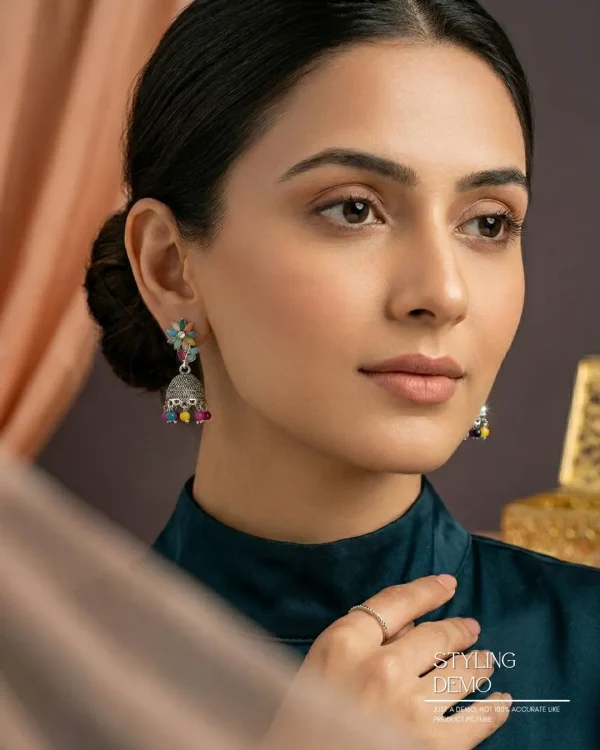 Traditional oxidized-style jhumka earrings with red, yellow and blue stones, perfect for saree, salwar and festive party looks from Passionate Bangladesh. Shop now at www.passionatebangladesh.com