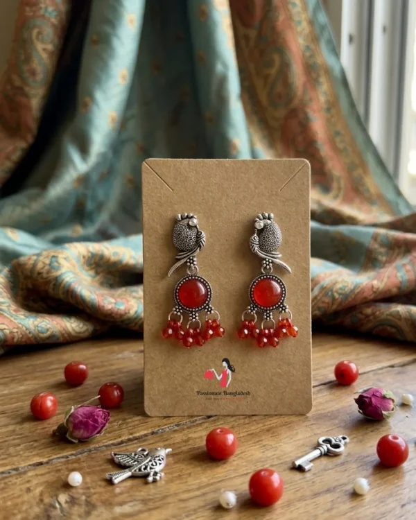Traditional oxidized-style jhumka earrings with red, yellow and blue stones, perfect for saree, salwar and festive party looks from Passionate Bangladesh. Shop now at www.passionatebangladesh.com