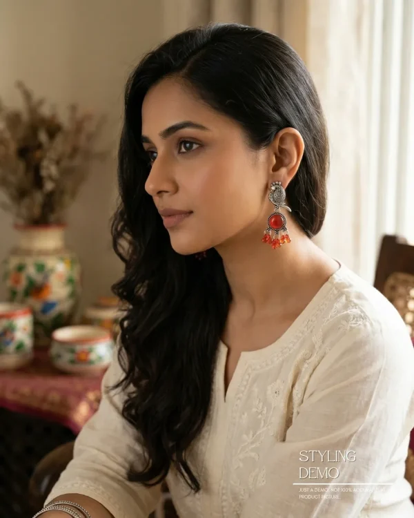 Traditional oxidized-style jhumka earrings with red, yellow and blue stones, perfect for saree, salwar and festive party looks from Passionate Bangladesh. Shop now at www.passionatebangladesh.com